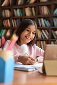 student in library