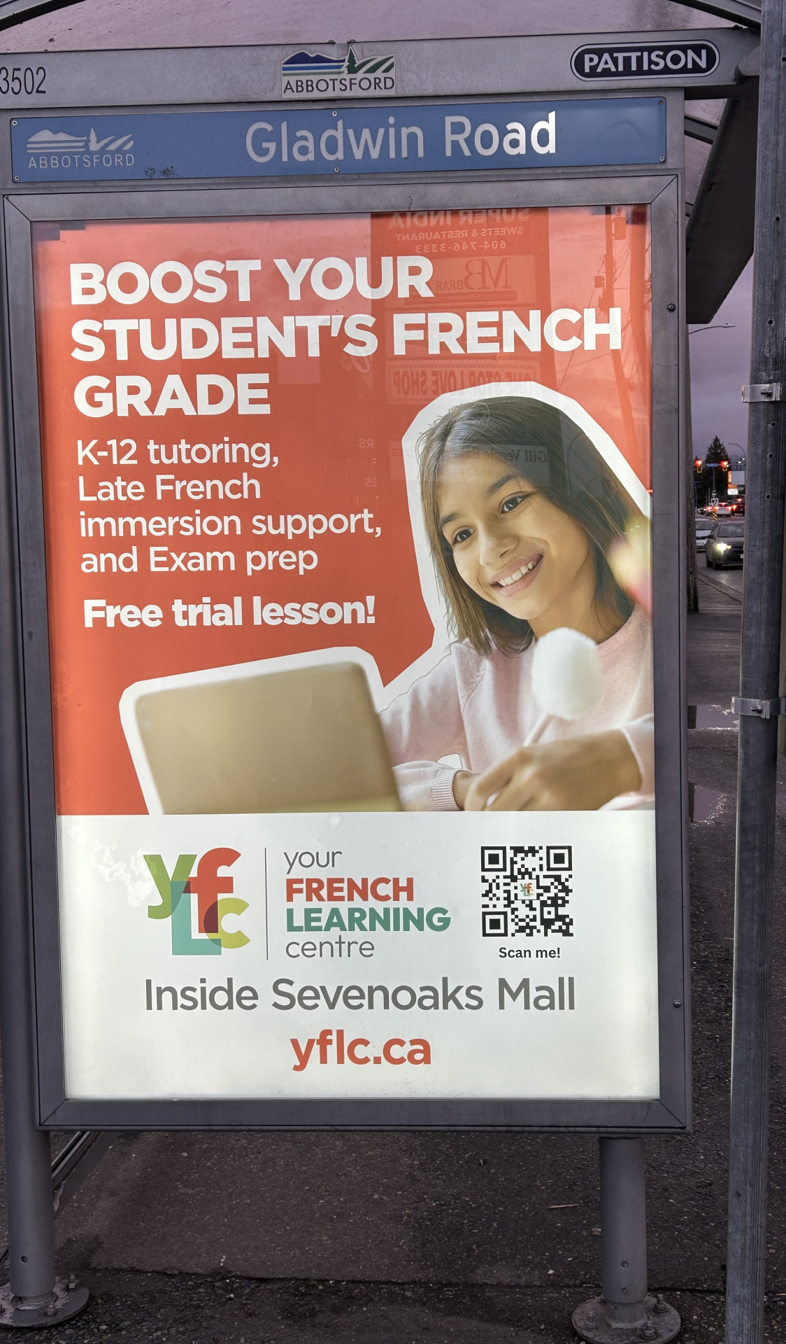 Billboard near Sevenoaks Shopping Centre promoting Your French Learning Centre--a French tutoring resource.